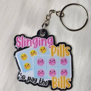 Slinging Pills to Pay the Bills keychain